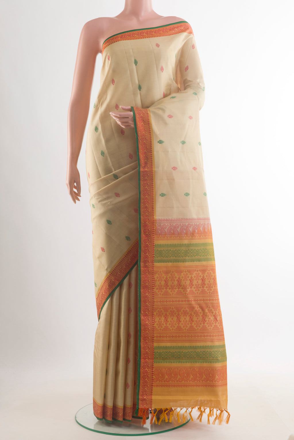Pure Silk Cream Kanchipuram Saree with Thread Butta on the body and Thread Border.  displayed on a mannequin