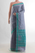 Pure Silk Grey Kanchipuram Saree with Thread Butta on the body and Thread Border.  displayed on a mannequin
