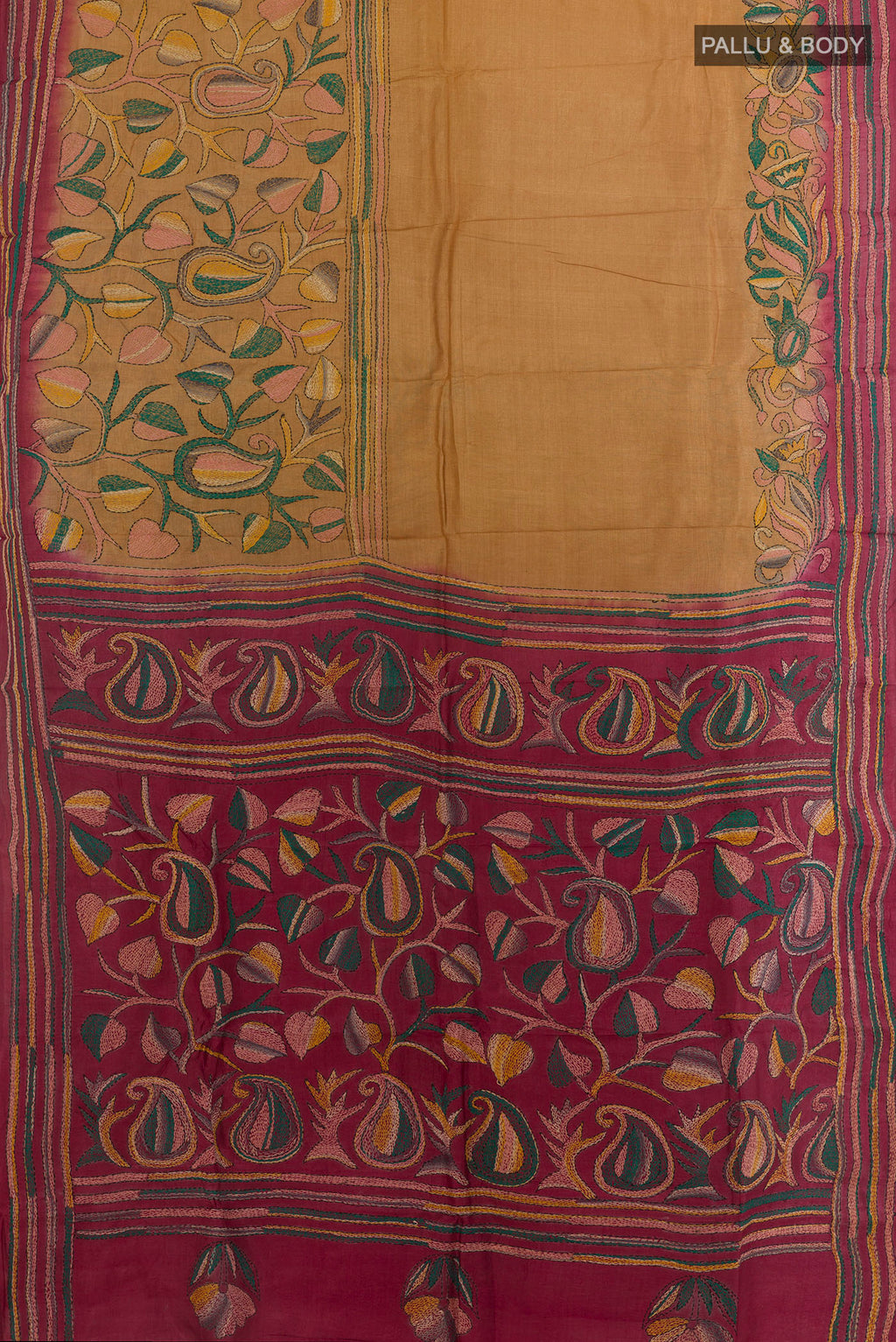 Flat view of Mustard Tussar Saree with Kantha Work on the body and Embroidery Border. 