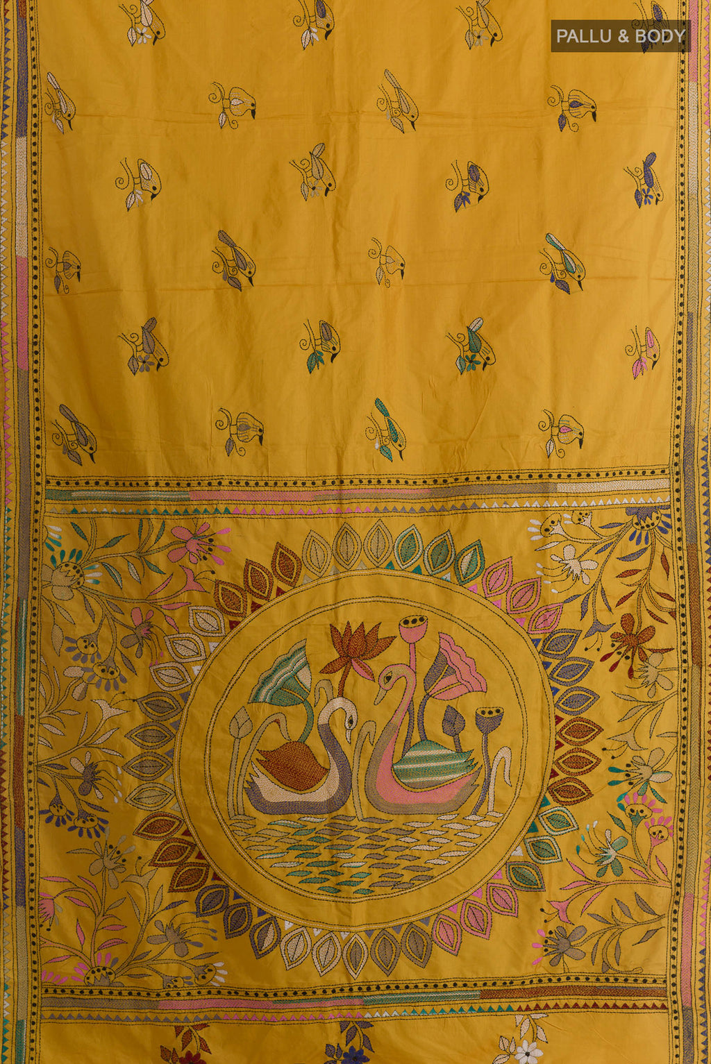 Flat view of Pure Silk Yellow Kantha Saree with Kantha Work on the body and Embroidery Border. 
