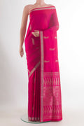 Pure Silk Pink Soft Saree with Zari Butta on the body and Zari Border.  displayed on a mannequin