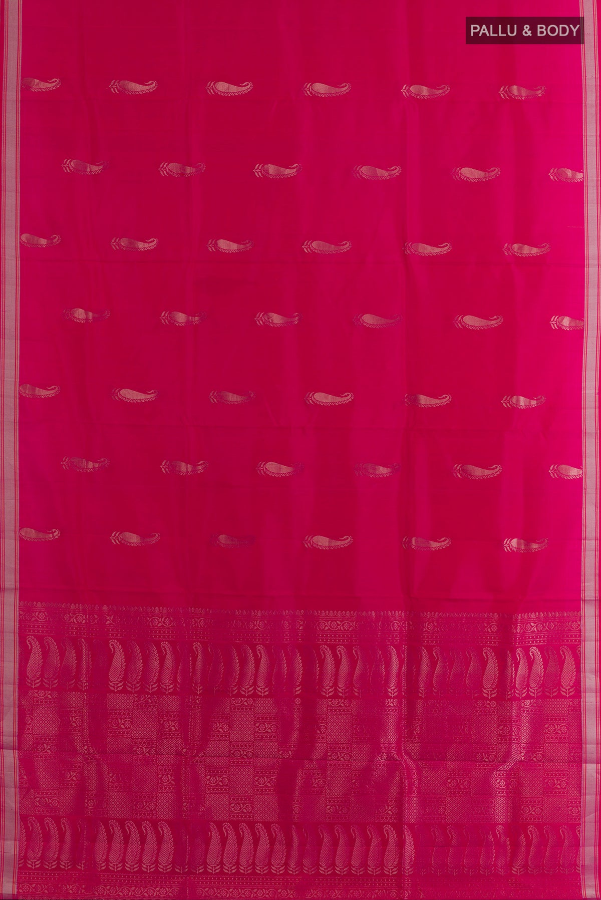 Flat view of Pure Silk Pink Soft Saree with Zari Butta on the body and Zari Border. 