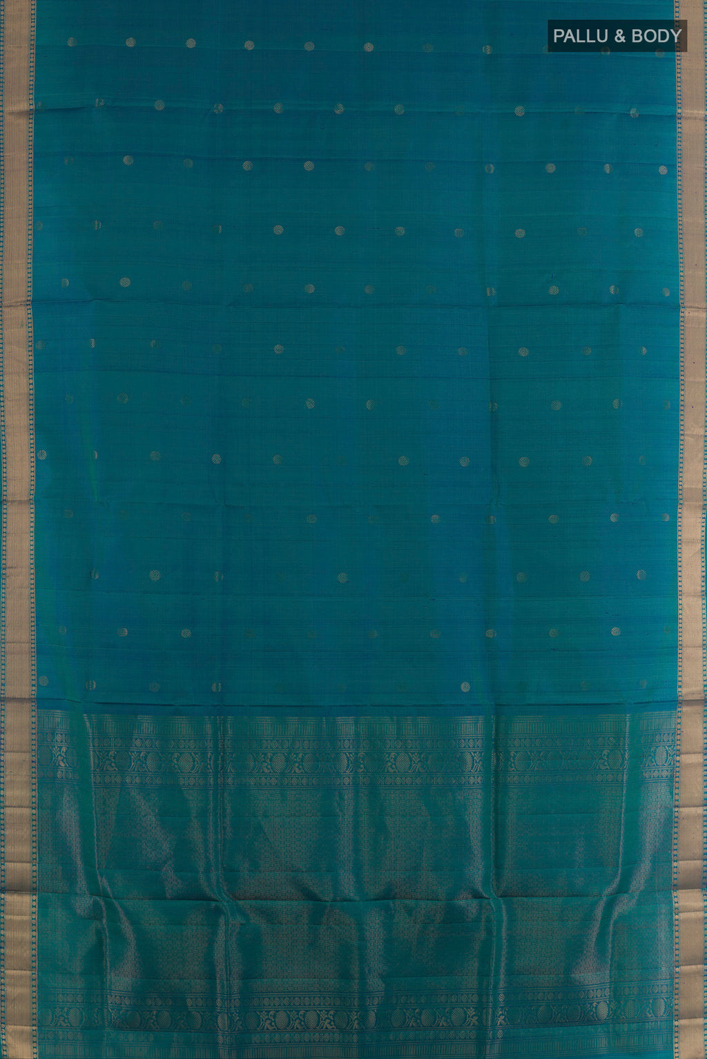 Flat view of Pure Silk Peacock Blue Soft Saree with Zari Butta on the body and Zari Border. 