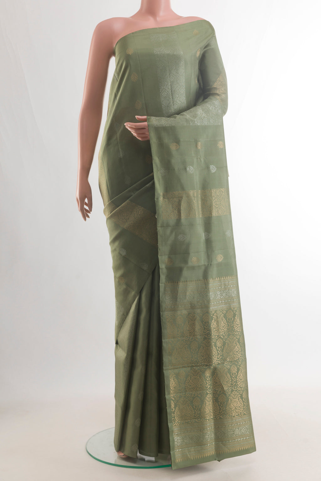 Pure Silk Olive Green Soft Saree with Stripes on the body and Without Border.  displayed on a mannequin