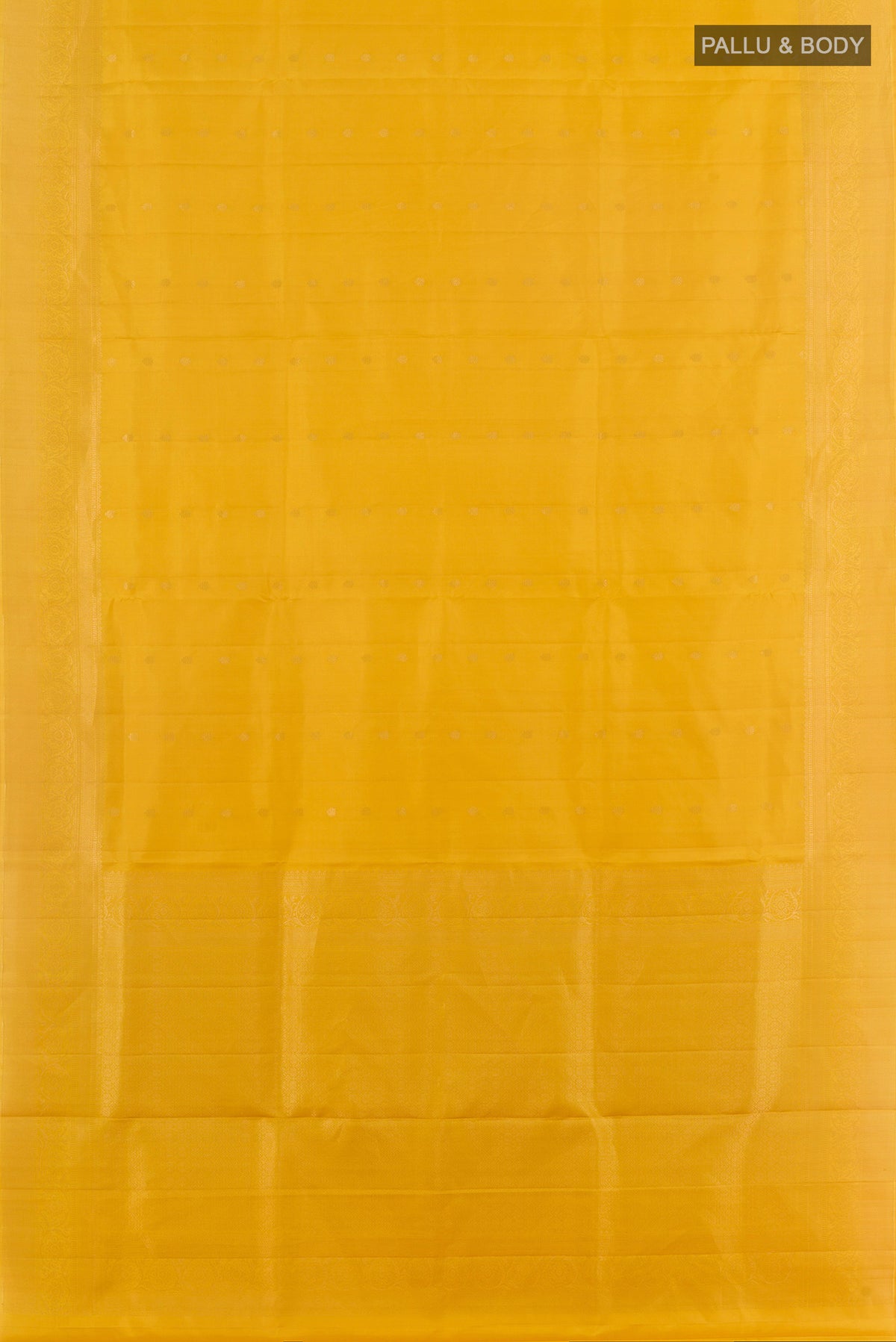 Flat view of Pure Silk Yellow Soft Saree with Zari Butta on the body and Zari Border. 