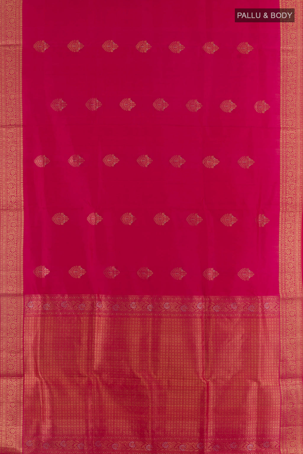 Flat view of Pure Silk Pink Soft Saree with Zari Butta on the body and Zari Border. 