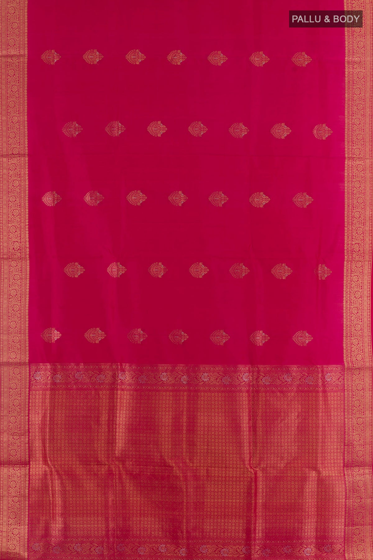 Flat view of Pure Silk Pink Soft Saree with Zari Butta on the body and Zari Border. 