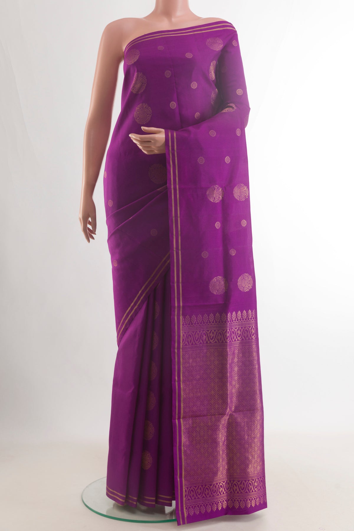 Pure Silk Purple Soft Saree with Zari Butta on the body and Zari Border.  displayed on a mannequin