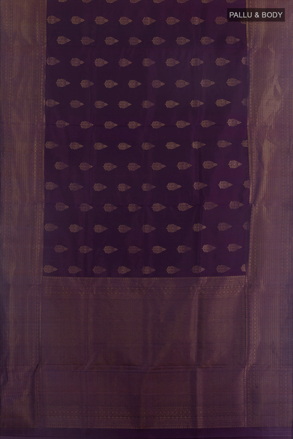 Flat view of Pure Silk Purple Soft Saree with Zari Butta on the body and Zari Border. 