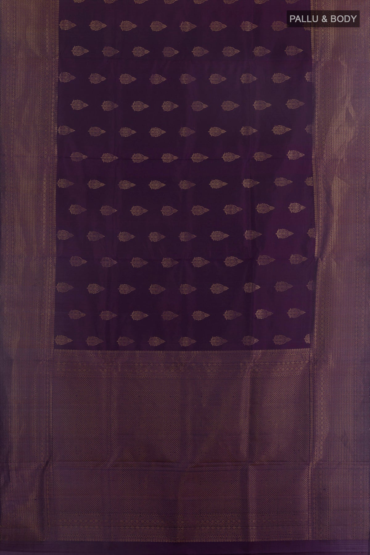 Flat view of Pure Silk Purple Soft Saree with Zari Butta on the body and Zari Border. 