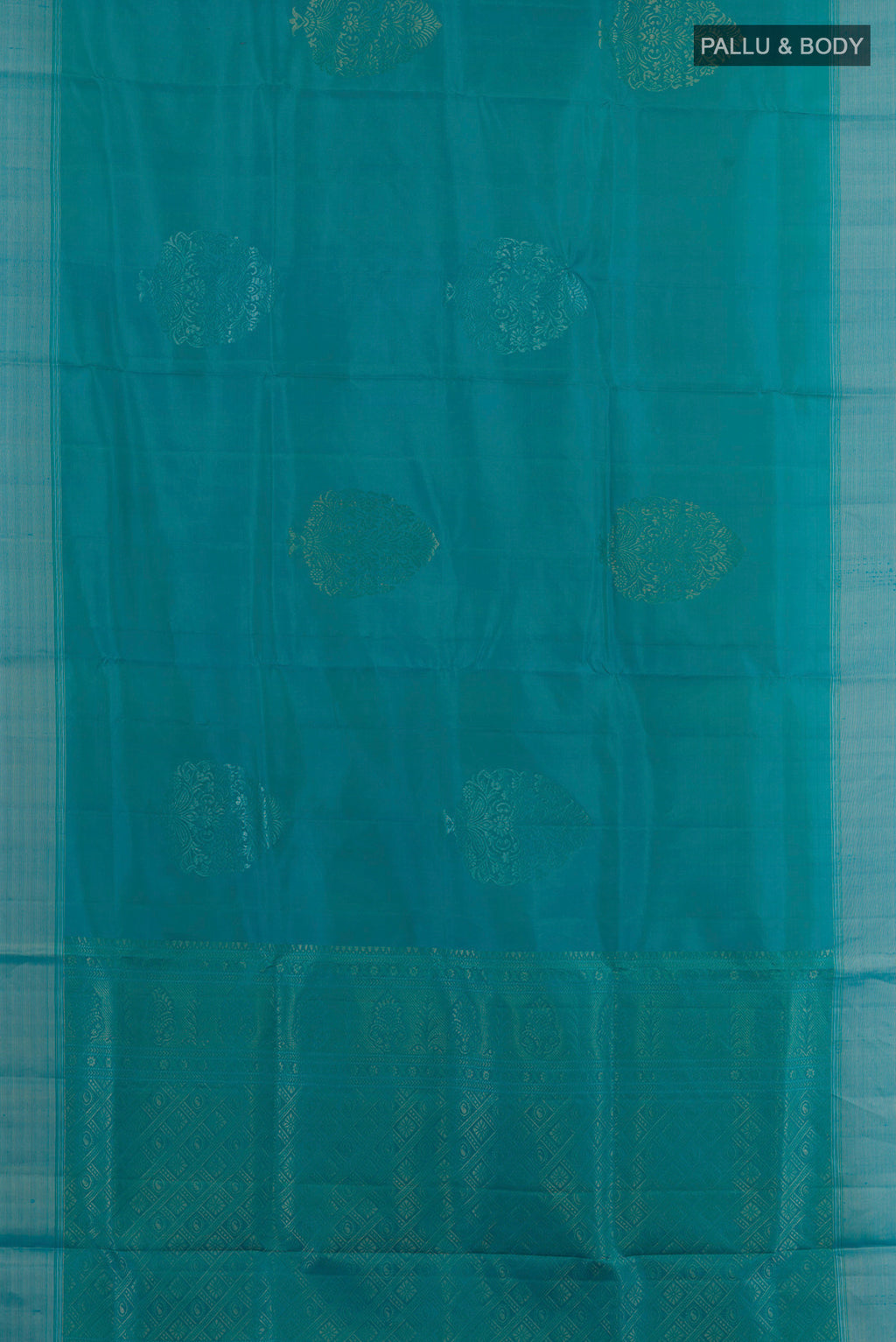 Flat view of Pure Silk Turquoise Soft Saree with Zari Butta on the body and Zari Border. 