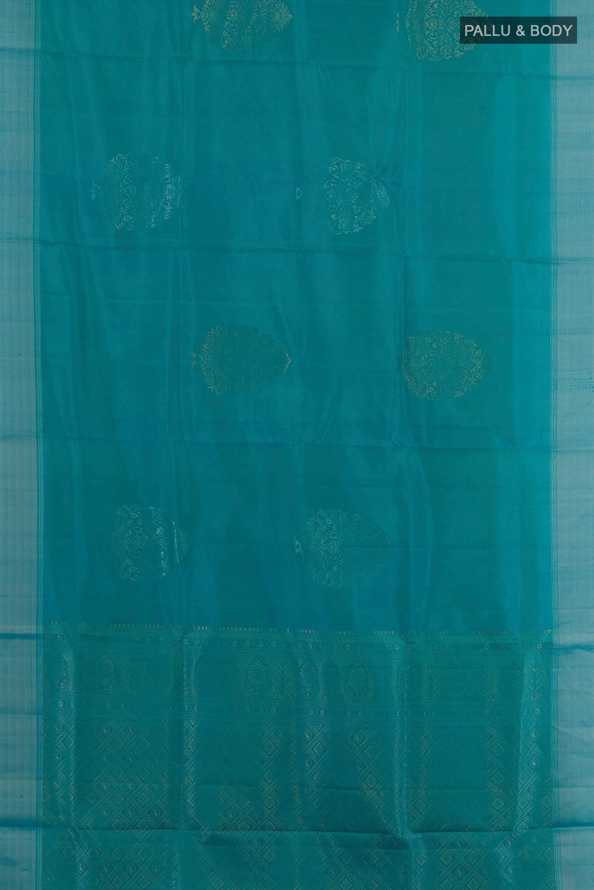 Flat view of Pure Silk Turquoise Soft Saree with Zari Butta on the body and Zari Border. 