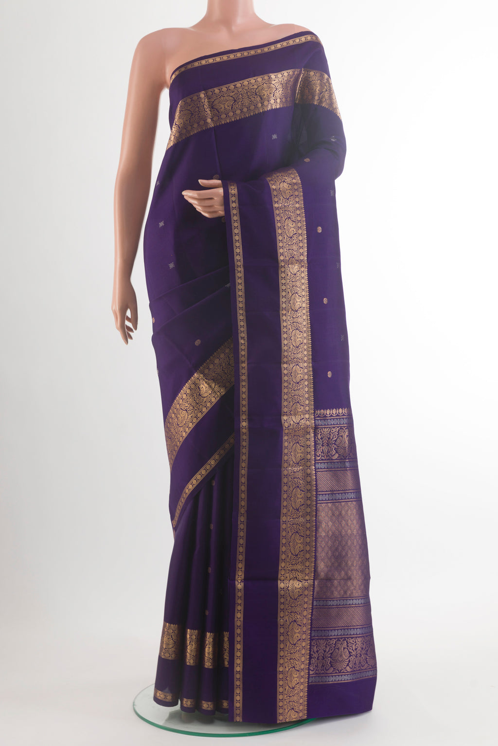 Pure Silk Navy Blue Soft Saree with Zari Butta on the body and Zari Border.  displayed on a mannequin
