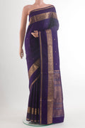 Pure Silk Navy Blue Soft Saree with Zari Butta on the body and Zari Border.  displayed on a mannequin