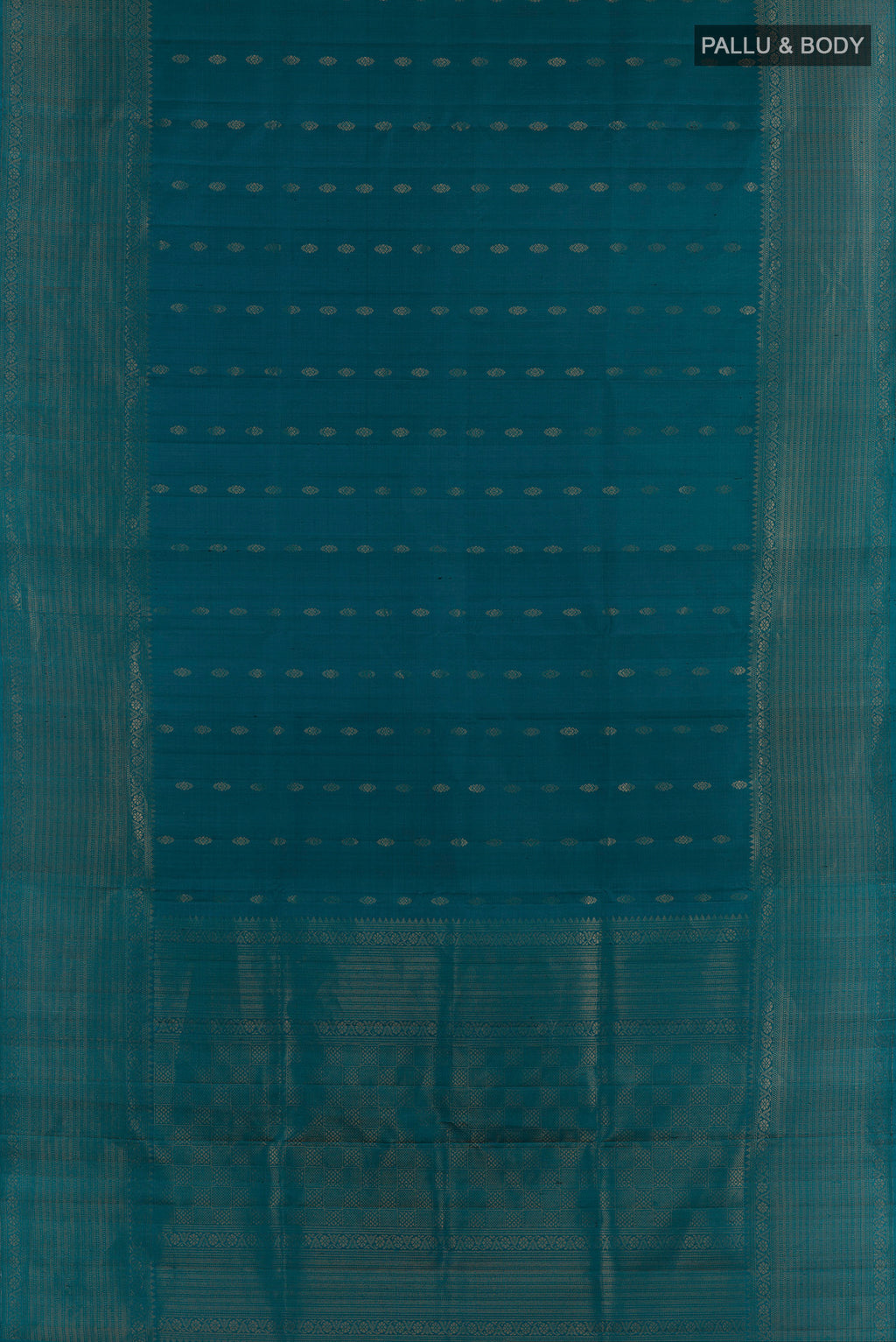 Flat view of Pure Silk Peacock Blue Soft Saree with Zari Butta on the body and Zari Border. 