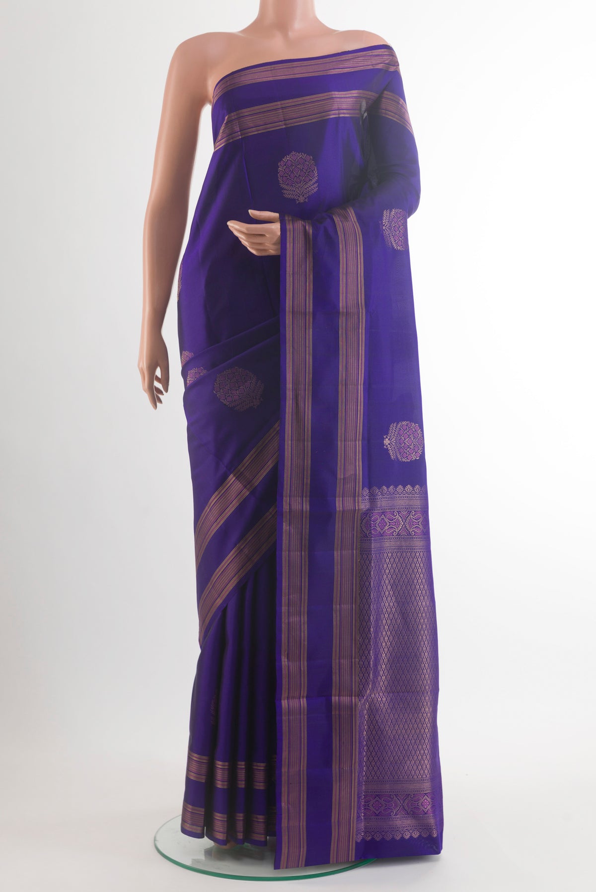 Pure Silk Blue Soft Saree with Zari Butta on the body and Zari Border.  displayed on a mannequin