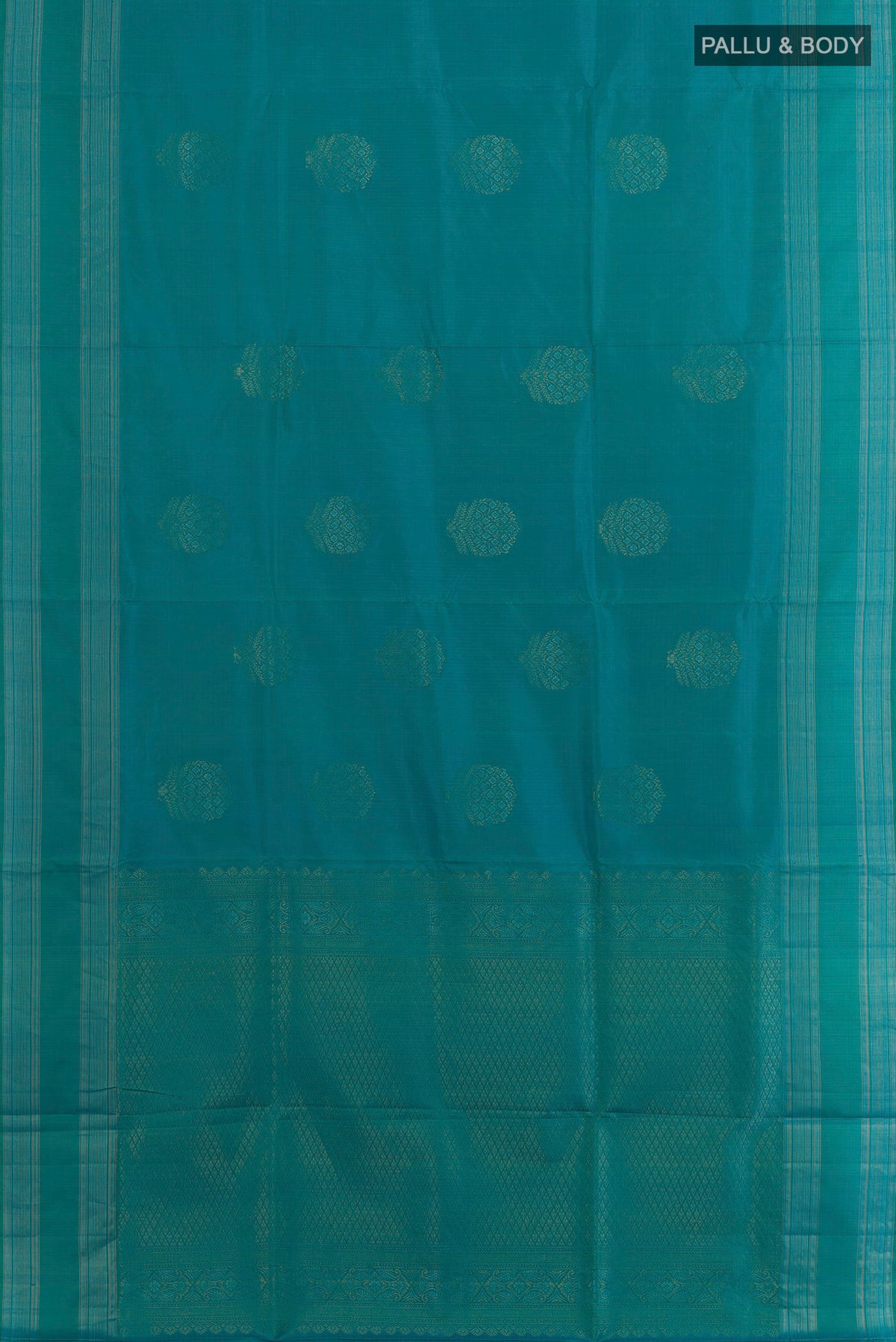Flat view of Pure Silk Turquoise Soft Saree with Zari Butta on the body and Zari Border. 