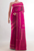 Pure Silk Pink Soft Saree with Zari Butta on the body and Zari Border.  displayed on a mannequin