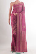 Pure Silk Pink Soft Saree with Zari Butta on the body and Zari Border.  displayed on a mannequin
