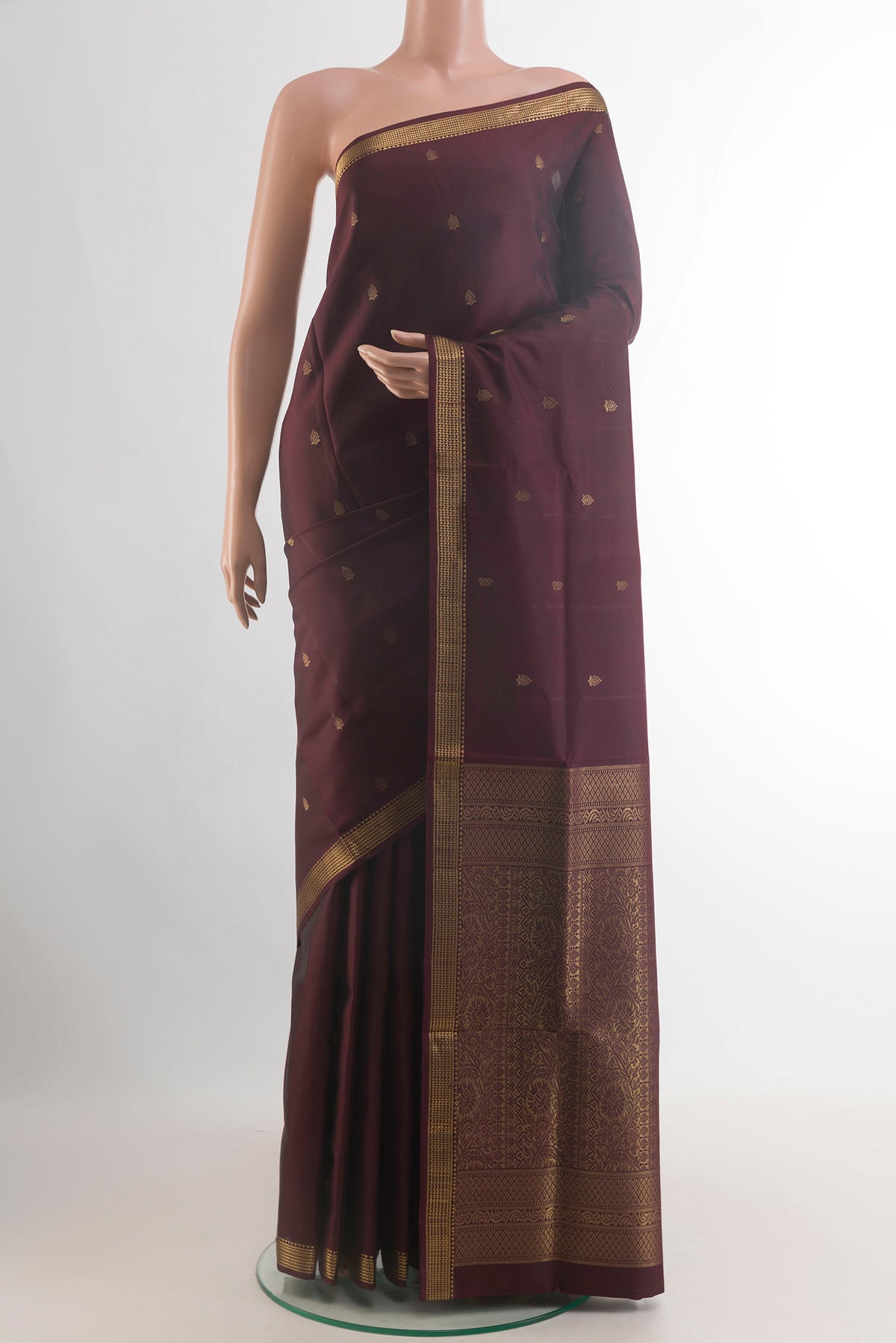 Pure Silk Coffee Brown Soft Saree with Zari Butta on the body and Zari Border.  displayed on a mannequin