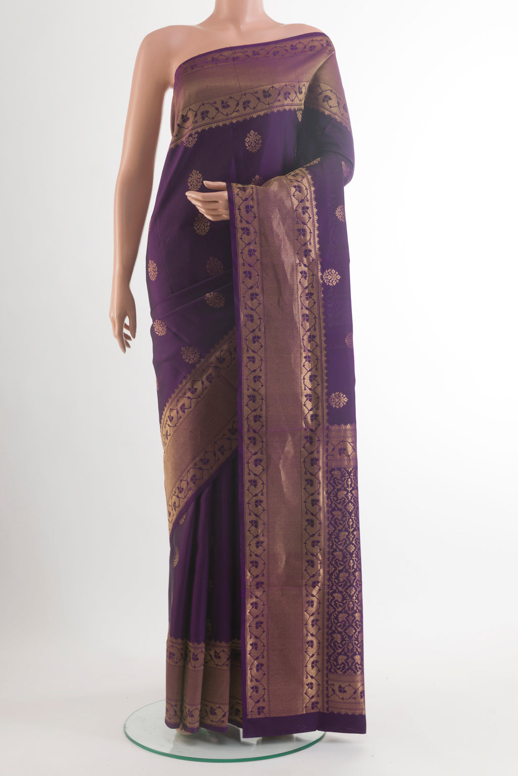 Pure Silk Purple Soft Saree with Zari Butta on the body and Zari Border.  displayed on a mannequin