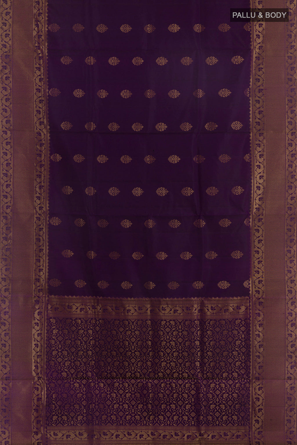 Flat view of Pure Silk Purple Soft Saree with Zari Butta on the body and Zari Border. 