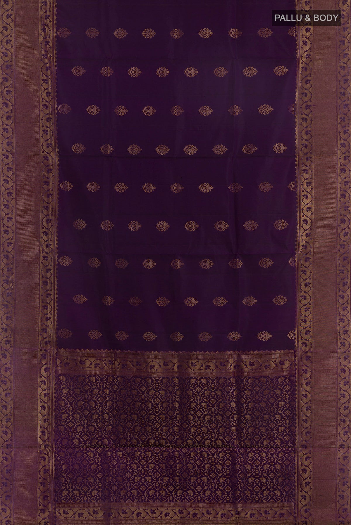 Flat view of Pure Silk Purple Soft Saree with Zari Butta on the body and Zari Border. 