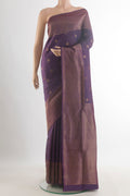Pure Silk Purple Soft Saree with Zari Butta on the body and Zari Border.  displayed on a mannequin