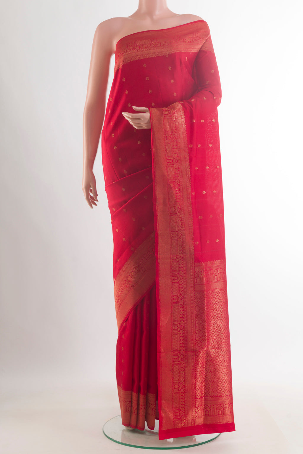 Pure Silk Red Soft Saree with Zari Butta on the body and Zari Border.  displayed on a mannequin