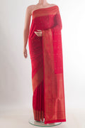 Pure Silk Red Soft Saree with Zari Butta on the body and Zari Border.  displayed on a mannequin