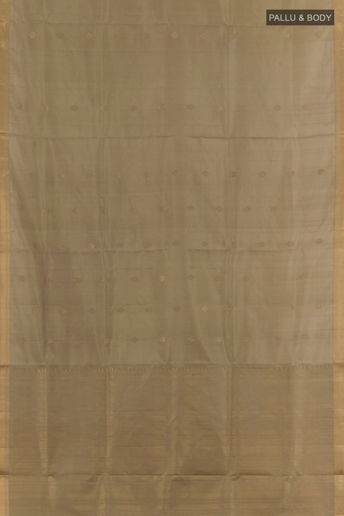 Flat view of Pure Silk Dark Beige Soft Saree with Zari Butta on the body and Zari Border. 