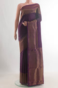 Pure Silk Purple Soft Saree with Plain Body and Zari Border.  displayed on a mannequin