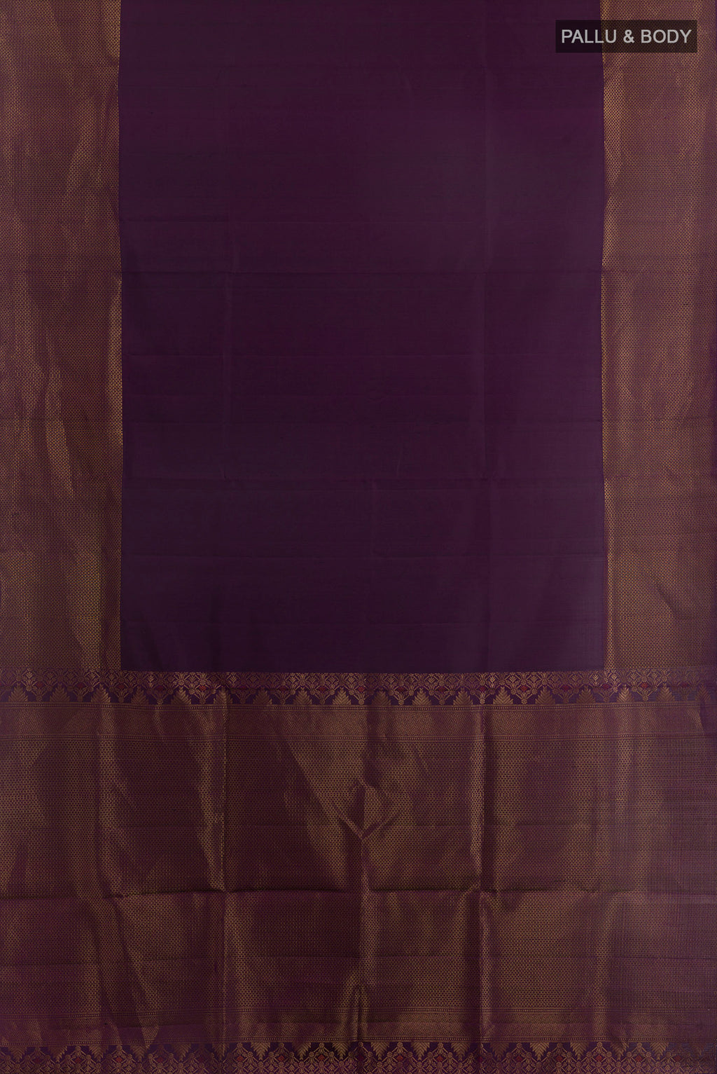 Flat view of Pure Silk Purple Soft Saree with Plain Body and Zari Border. 