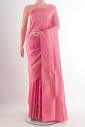Pure Silk Pink Soft Saree with Plain Body and Zari Border.  displayed on a mannequin