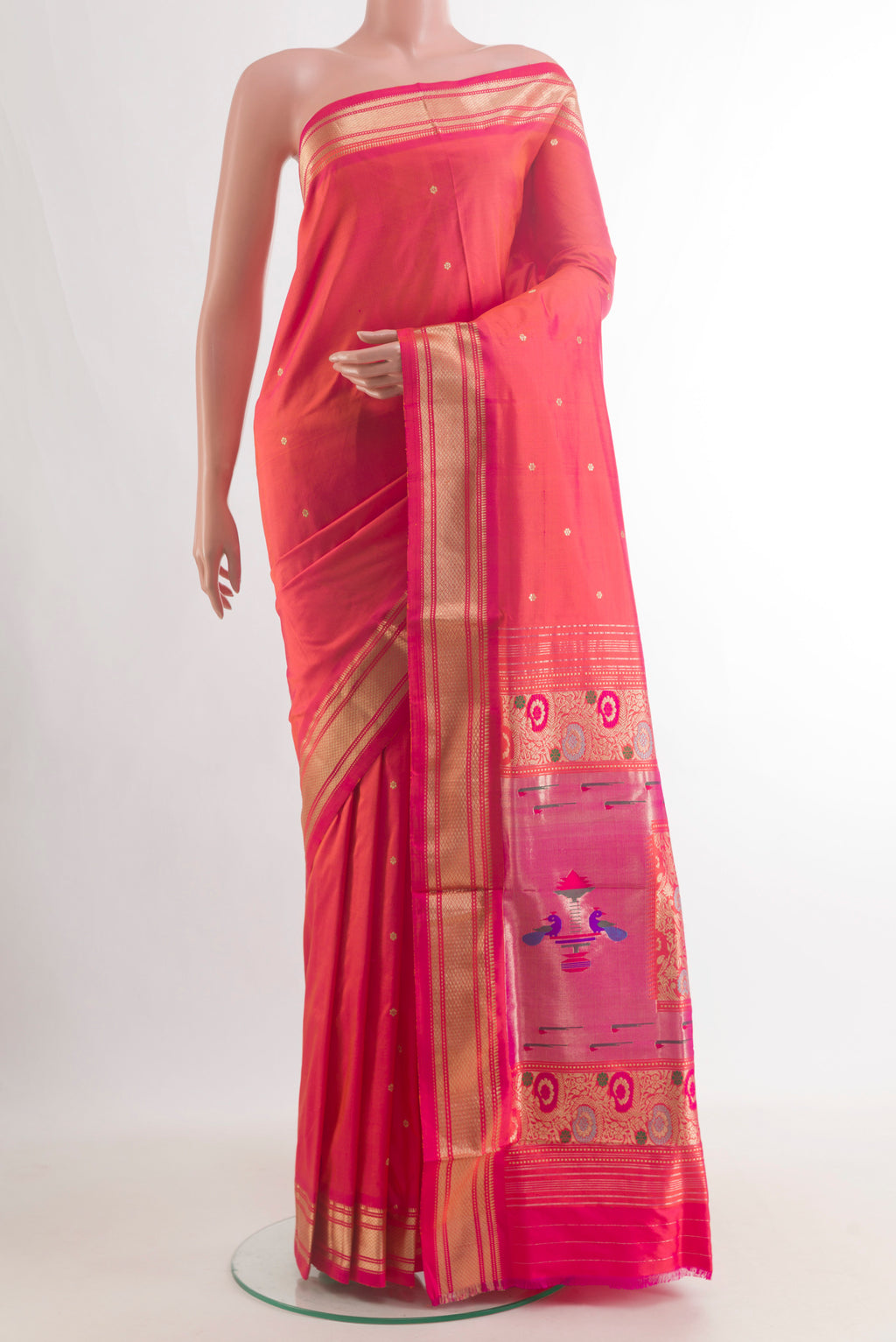 Pure Silk Brick Orange Dual Tone Paithani Saree with Zari Butta on the body and Zari Border.  displayed on a mannequin