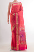 Pure Silk Brick Orange Dual Tone Paithani Saree with Zari Butta on the body and Zari Border.  displayed on a mannequin