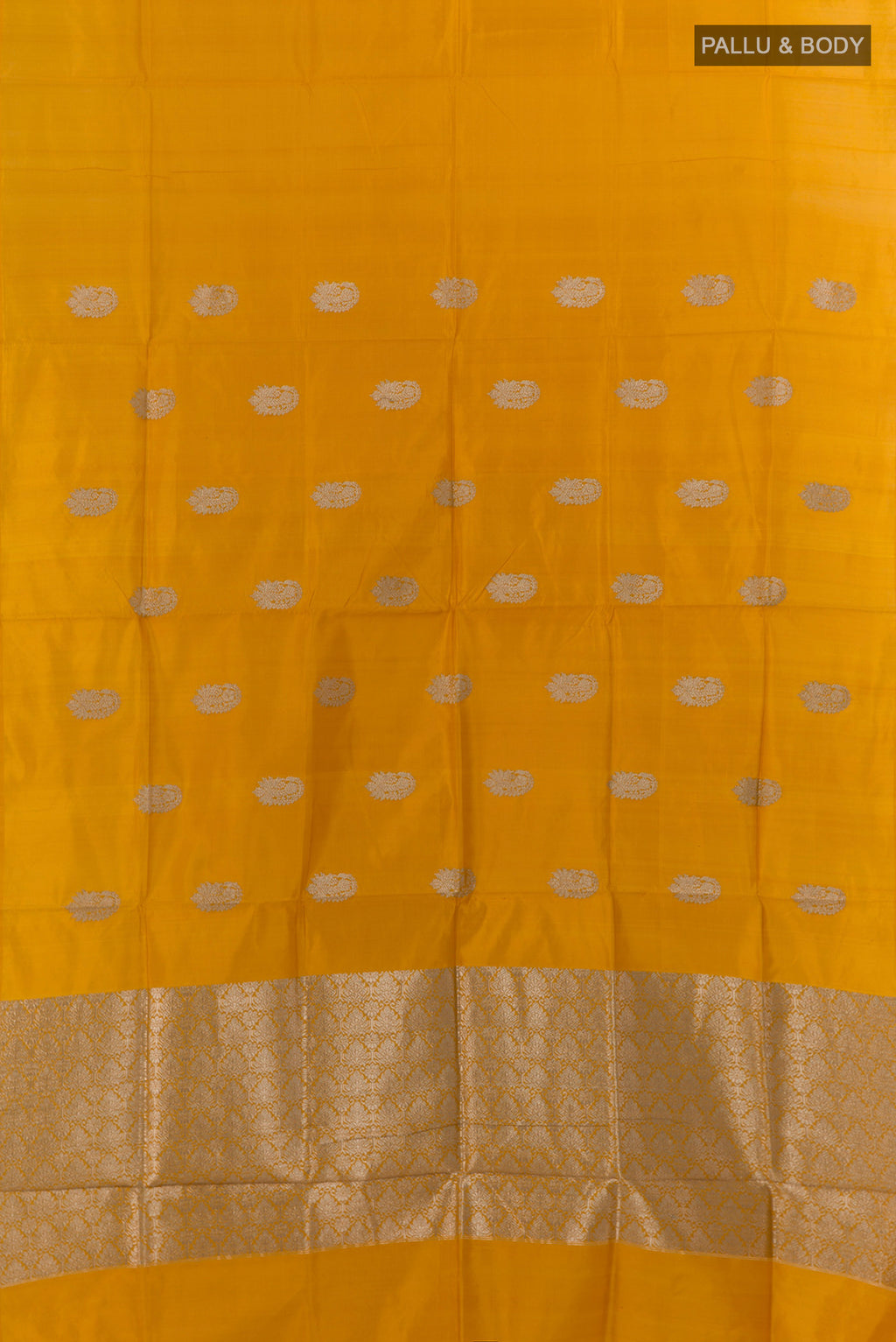 Flat view of Pure Silk Yellow Banarasi Katan Saree with Zari Butta on the body and Without Border. 