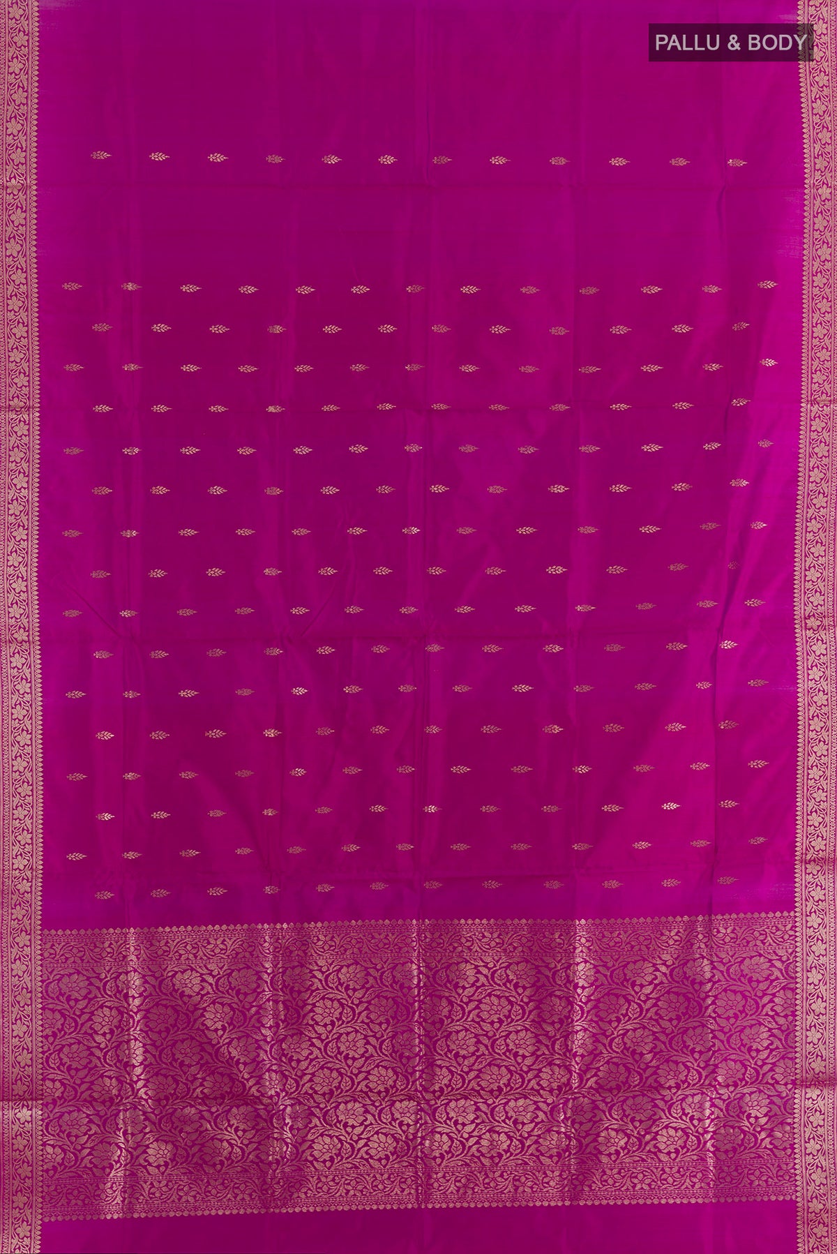 Flat view of Pure Silk Magenta Banarasi Katan Saree with Zari Butta on the body and Zari Border. 