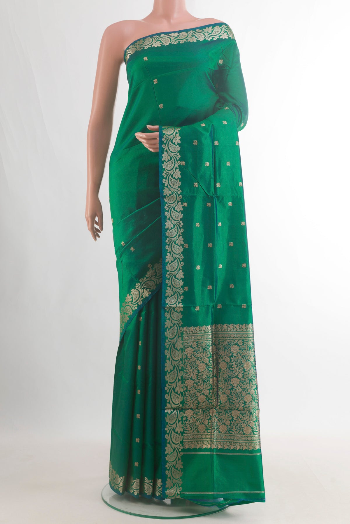Pure Silk Green Banarasi Katan Saree with Zari Butta on the body and Zari Border.  displayed on a mannequin