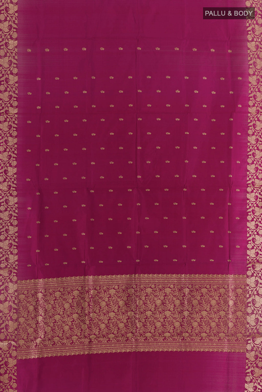 Flat view of Pure Silk Magenta Banarasi Katan Saree with Zari Butta on the body and Zari Border. 