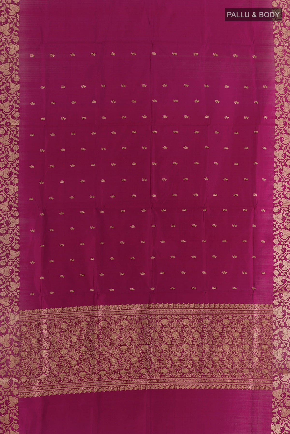 Flat view of Pure Silk Magenta Banarasi Katan Saree with Zari Butta on the body and Zari Border. 