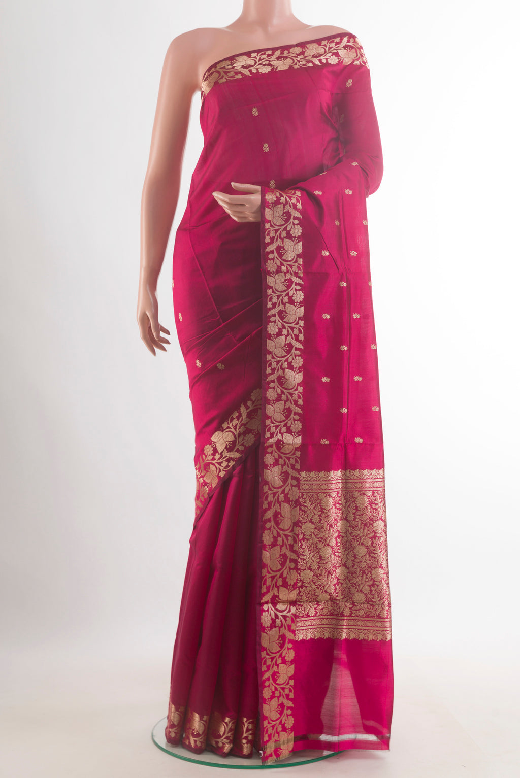 Pure Silk Dark Pink Banarasi Katan Saree with Zari Butta on the body and Zari Border.  displayed on a mannequin