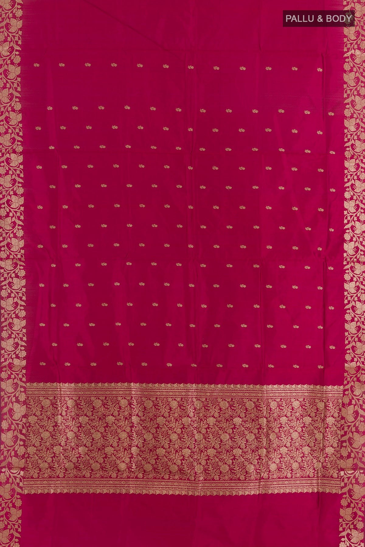 Flat view of Pure Silk Dark Pink Banarasi Katan Saree with Zari Butta on the body and Zari Border. 