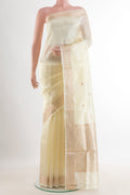 Pure Silk Off White Banarasi Katan Saree with Zari Butta on the body and Zari Border.  displayed on a mannequin