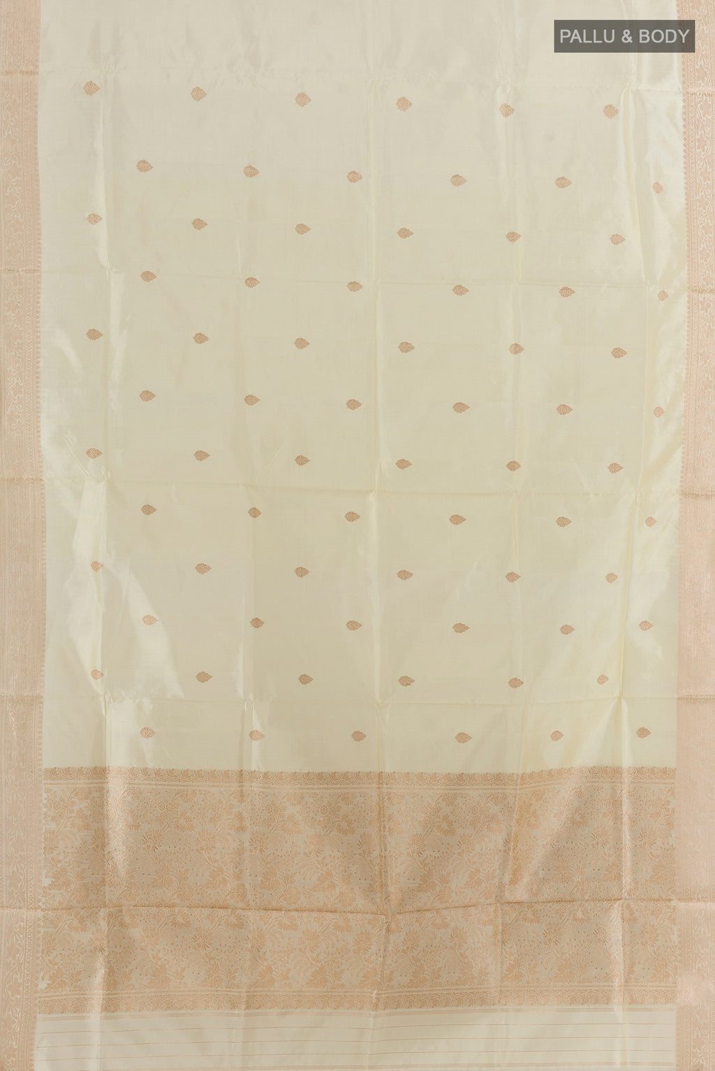 Flat view of Pure Silk Off White Banarasi Katan Saree with Zari Butta on the body and Zari Border. 