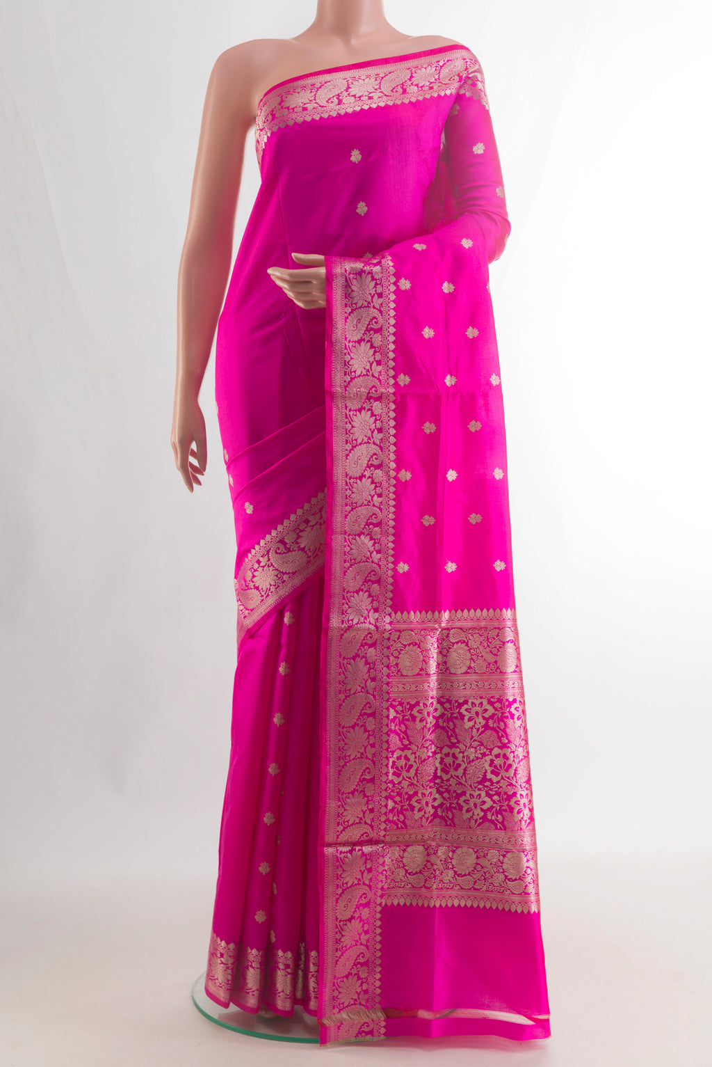Pure Silk Pink Banarasi Katan Saree with Zari Butta on the body and Zari Border.  displayed on a mannequin