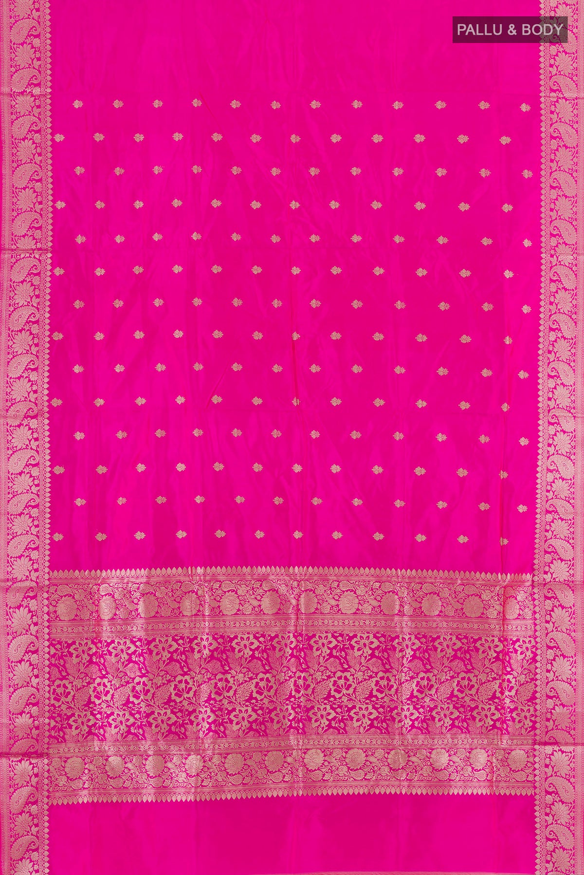 Flat view of Pure Silk Pink Banarasi Katan Saree with Zari Butta on the body and Zari Border. 