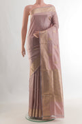 Pure Silk Rose Gold Banarasi Katan Saree with Zari Butta on the body and Zari Border.  displayed on a mannequin