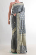 Pure Silk Grey Banarasi Katan Saree with Thread Butta on the body and Thread Border.  displayed on a mannequin