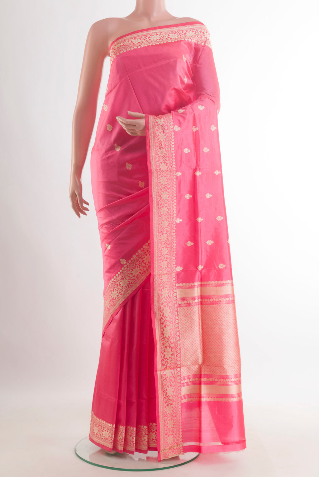Pure Silk Pink Banarasi Katan Saree with Thread Butta on the body and Thread Border.  displayed on a mannequin